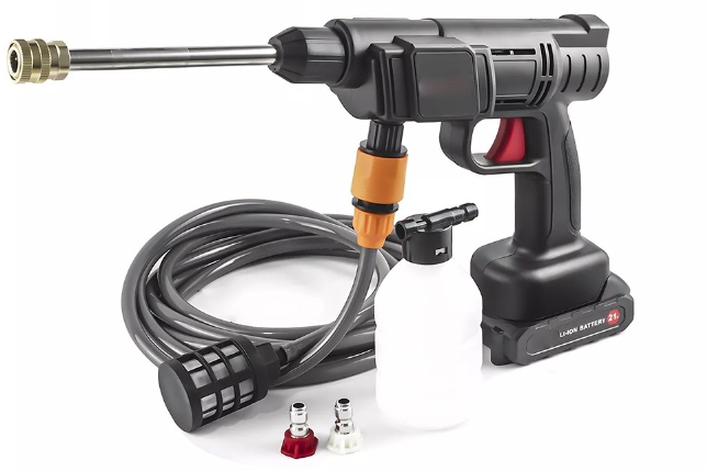 An aerial view of a wastewater treatment facility featuring eight large, rectangular sedimentation tanks arranged in two rows. Each tank contains circulating water, likely part of the treatment process. The tanks are surrounded by green grass, giving a structured and organized appearance.